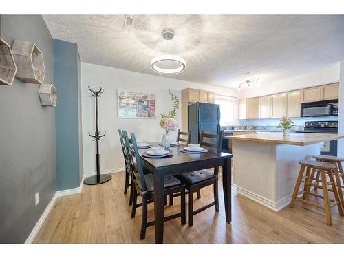 712-1540 29 Street Nw, Calgary, AB - Indoor Photo Showing Dining Room