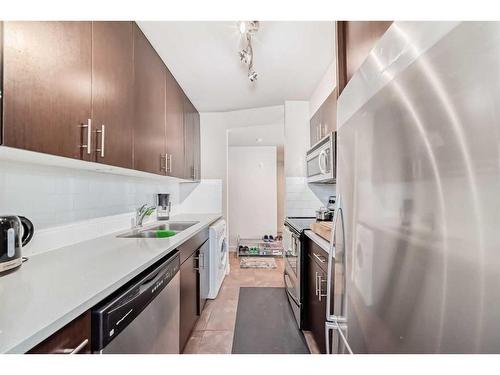 15-1230 Cameron Avenue Sw, Calgary, AB - Indoor Photo Showing Kitchen With Stainless Steel Kitchen With Double Sink With Upgraded Kitchen