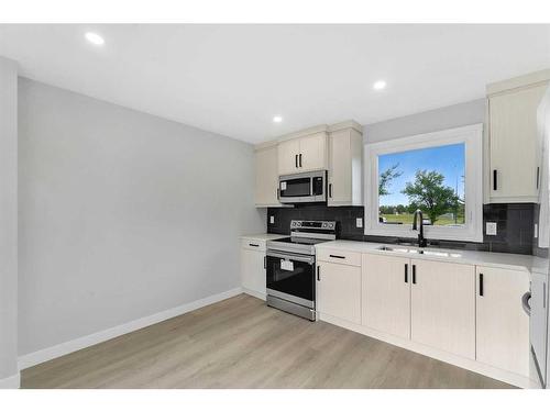 3869 Fonda Way Se, Calgary, AB - Indoor Photo Showing Kitchen