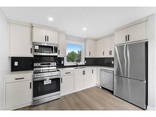 3869 Fonda Way Se, Calgary, AB - Indoor Photo Showing Kitchen With Stainless Steel Kitchen