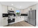 3869 Fonda Way Se, Calgary, AB  - Indoor Photo Showing Kitchen With Stainless Steel Kitchen 