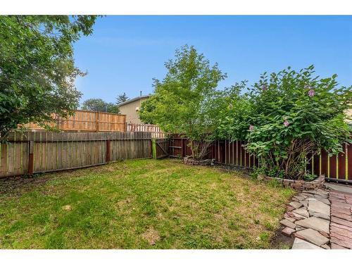 3869 Fonda Way Se, Calgary, AB - Outdoor With Backyard