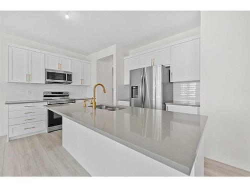 40 Carringham Gate Nw, Calgary, AB - Indoor Photo Showing Kitchen With Stainless Steel Kitchen With Double Sink With Upgraded Kitchen