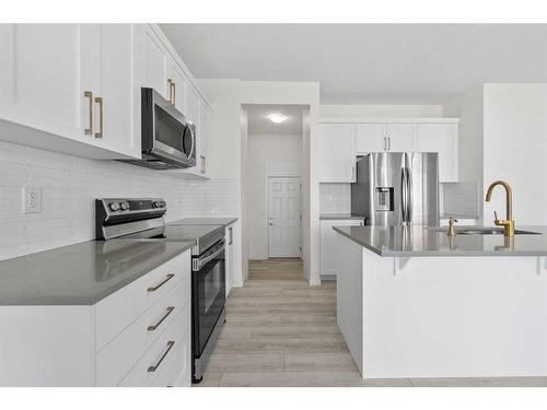 40 Carringham Gate Nw, Calgary, AB - Indoor Photo Showing Kitchen With Stainless Steel Kitchen With Upgraded Kitchen