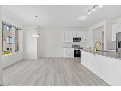 40 Carringham Gate Nw, Calgary, AB - Indoor Photo Showing Kitchen With Upgraded Kitchen