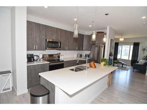 222 148 Avenue Nw, Calgary, AB - Indoor Photo Showing Kitchen With Stainless Steel Kitchen With Double Sink With Upgraded Kitchen