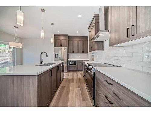 482 Lucas Way Nw, Calgary, AB - Indoor Photo Showing Kitchen With Upgraded Kitchen