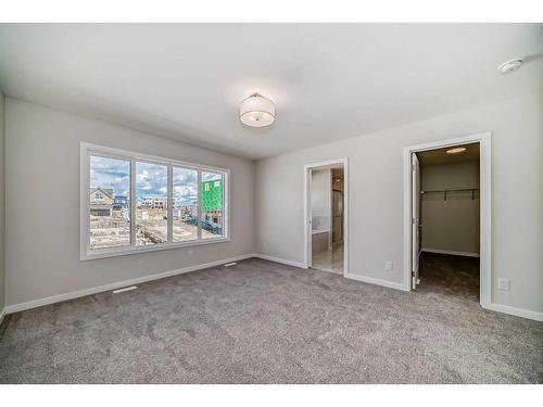 482 Lucas Way Nw, Calgary, AB - Indoor Photo Showing Other Room