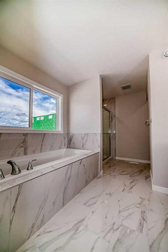 482 Lucas Way Nw, Calgary, AB - Indoor Photo Showing Bathroom
