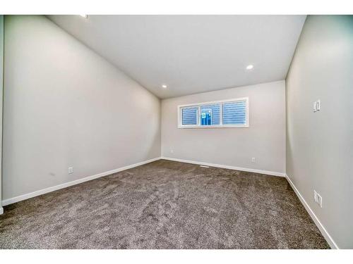 482 Lucas Way Nw, Calgary, AB - Indoor Photo Showing Other Room