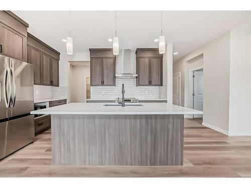 482 Lucas Way Nw, Calgary, AB - Indoor Photo Showing Kitchen With Stainless Steel Kitchen With Upgraded Kitchen