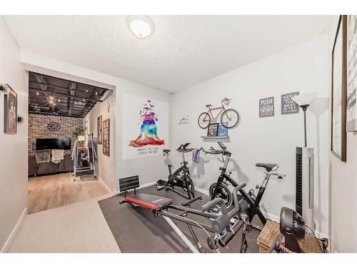 31-5616 14 Avenue Sw, Calgary, AB - Indoor Photo Showing Gym Room