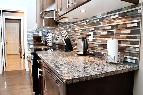 121 Lalor Drive Se, Red Deer, AB - Indoor Photo Showing Kitchen With Upgraded Kitchen