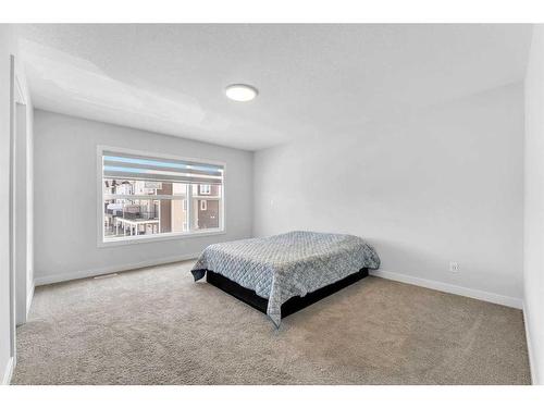 291 Seton Road Se, Calgary, AB - Indoor Photo Showing Bedroom