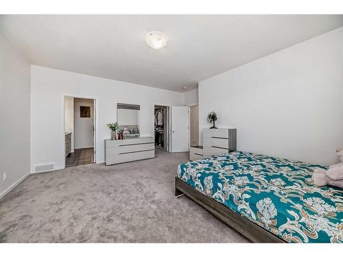 2102 Windbury Crescent Sw, Airdrie, AB - Indoor Photo Showing Bedroom