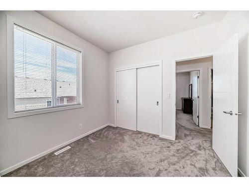 2102 Windbury Crescent Sw, Airdrie, AB - Indoor Photo Showing Other Room