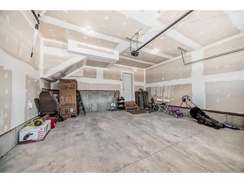 2102 Windbury Crescent Sw, Airdrie, AB - Indoor Photo Showing Garage