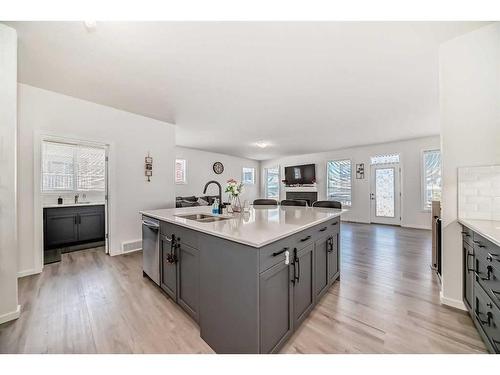 2102 Windbury Crescent Sw, Airdrie, AB - Indoor Photo Showing Kitchen With Double Sink