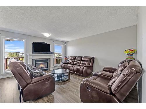 55 Tarington Gardens Ne, Calgary, AB - Indoor Photo Showing Living Room With Fireplace