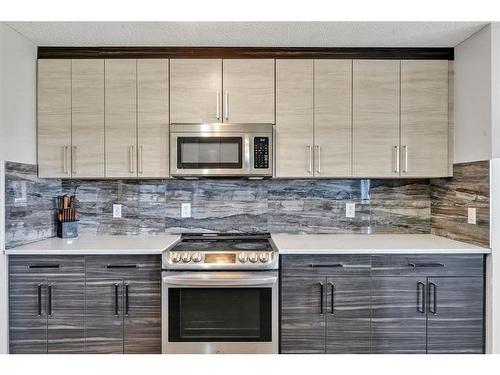 55 Tarington Gardens Ne, Calgary, AB - Indoor Photo Showing Kitchen With Upgraded Kitchen