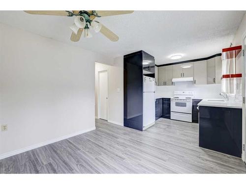 140-999 Canyon Meadows Drive Sw, Calgary, AB - Indoor Photo Showing Kitchen