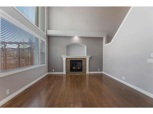119 Aspen Stone Terrace Sw, Calgary, AB - Indoor With Fireplace