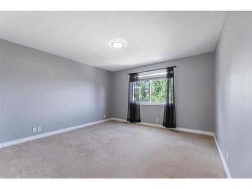 119 Aspen Stone Terrace Sw, Calgary, AB - Indoor Photo Showing Other Room