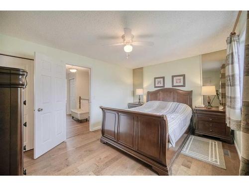 111 Hawkfield Crescent Nw, Calgary, AB - Indoor Photo Showing Bedroom