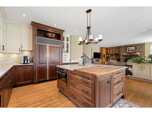 43 Cody Range Way, Rural Rocky View County, AB - Indoor Photo Showing Kitchen With Upgraded Kitchen