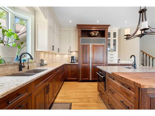 43 Cody Range Way, Rural Rocky View County, AB - Indoor Photo Showing Kitchen With Double Sink With Upgraded Kitchen