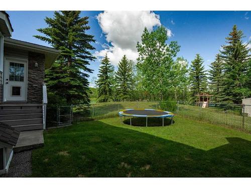 43 Cody Range Way, Rural Rocky View County, AB - Outdoor With Backyard