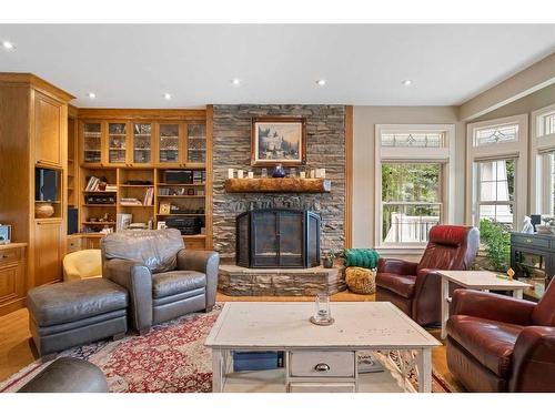 43 Cody Range Way, Rural Rocky View County, AB - Indoor Photo Showing Living Room With Fireplace