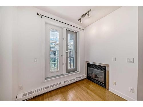 311-328 21 Avenue Sw, Calgary, AB - Indoor With Fireplace