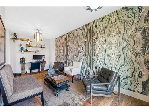 18 Whispering Springs Way, Heritage Pointe, AB - Indoor Photo Showing Living Room