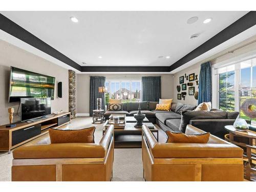 18 Whispering Springs Way, Heritage Pointe, AB - Indoor Photo Showing Living Room