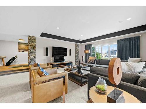 18 Whispering Springs Way, Heritage Pointe, AB - Indoor Photo Showing Living Room