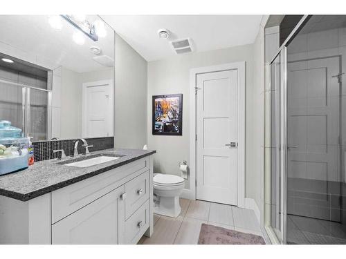 18 Whispering Springs Way, Heritage Pointe, AB - Indoor Photo Showing Bathroom