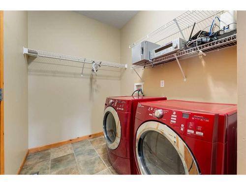 85 Tuscany Reserve Gate Nw, Calgary, AB - Indoor Photo Showing Laundry Room