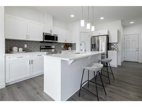 3093 Key Drive Sw, Airdrie, AB - Indoor Photo Showing Kitchen With Upgraded Kitchen