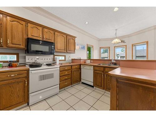 5609 60 Avenue, Olds, AB - Indoor Photo Showing Kitchen With Double Sink