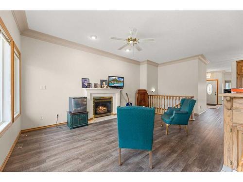 5609 60 Avenue, Olds, AB - Indoor Photo Showing Living Room With Fireplace