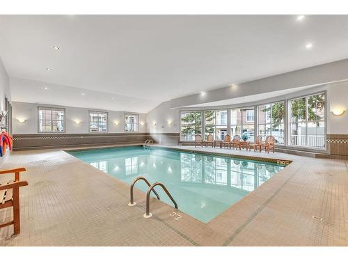 212-3650 Marda Link Sw, Calgary, AB - Indoor Photo Showing Other Room With In Ground Pool