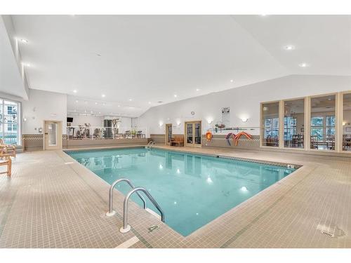 212-3650 Marda Link Sw, Calgary, AB - Indoor Photo Showing Other Room With In Ground Pool