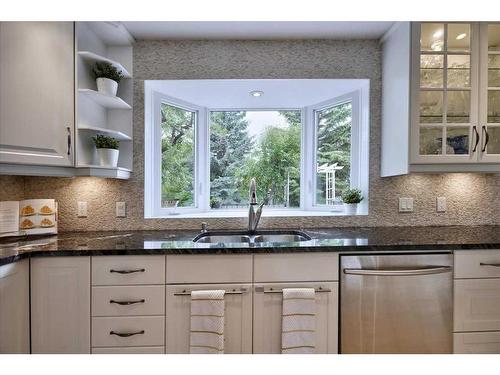 15 Strathaven Circle Sw, Calgary, AB - Indoor Photo Showing Kitchen With Double Sink With Upgraded Kitchen