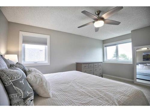 15 Strathaven Circle Sw, Calgary, AB - Indoor Photo Showing Bedroom