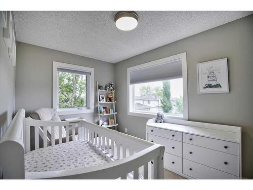 15 Strathaven Circle Sw, Calgary, AB - Indoor Photo Showing Bedroom