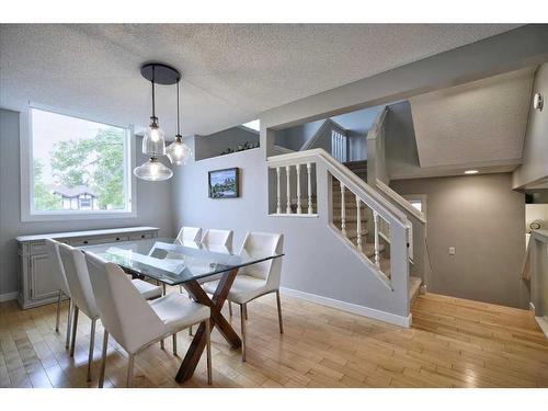 15 Strathaven Circle Sw, Calgary, AB - Indoor Photo Showing Dining Room