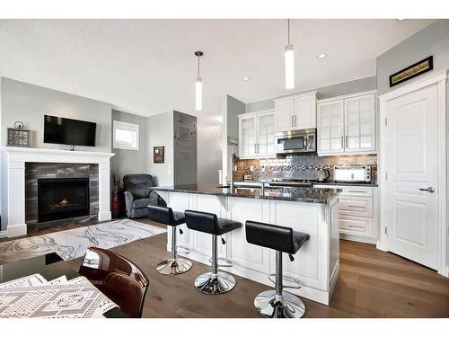 55 Nolanlake View Nw, Calgary, AB - Indoor Photo Showing Kitchen With Fireplace With Upgraded Kitchen