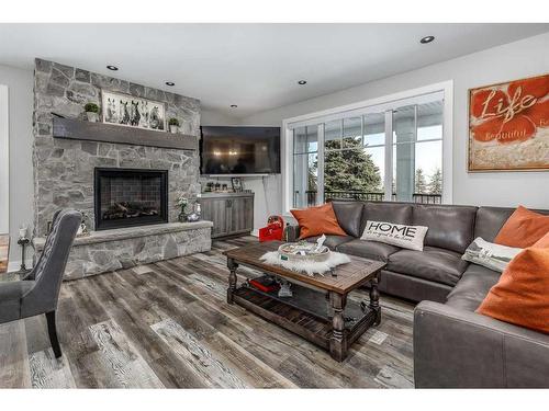 34131 Township Road 262, Rural Rocky View County, AB - Indoor Photo Showing Living Room With Fireplace