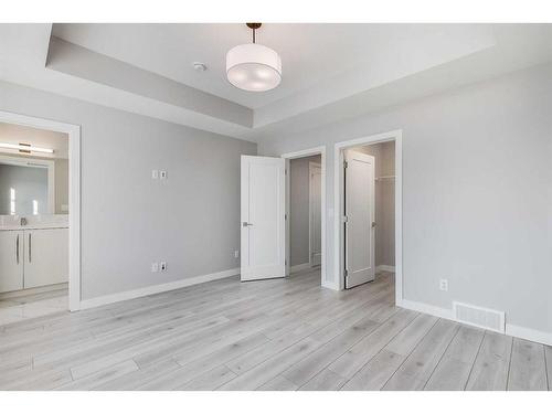 121 Dawson Circle, Chestermere, AB - Indoor Photo Showing Other Room